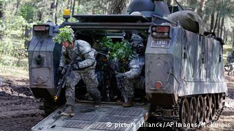 troops on manouvre copyright: Photo/Mindaugas Kulbis) picture alliance/AP Images