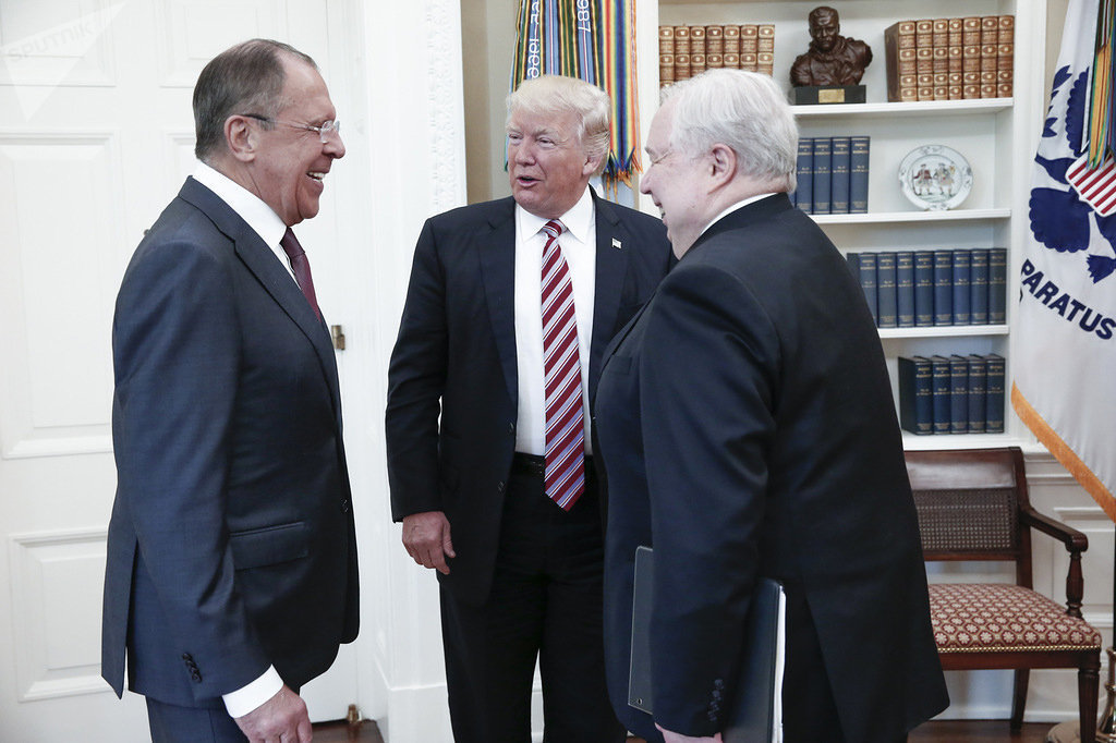 A handout photo made available by the Russian Foreign Ministry on May 10, 2017 shows US President Donald J. Trump (C) speaking with Russian Foreign Minister Sergei Lavrov (L) and Russian Ambassador to the U.S. Sergei Kislyak during a meeting at the White House in Washington, DC