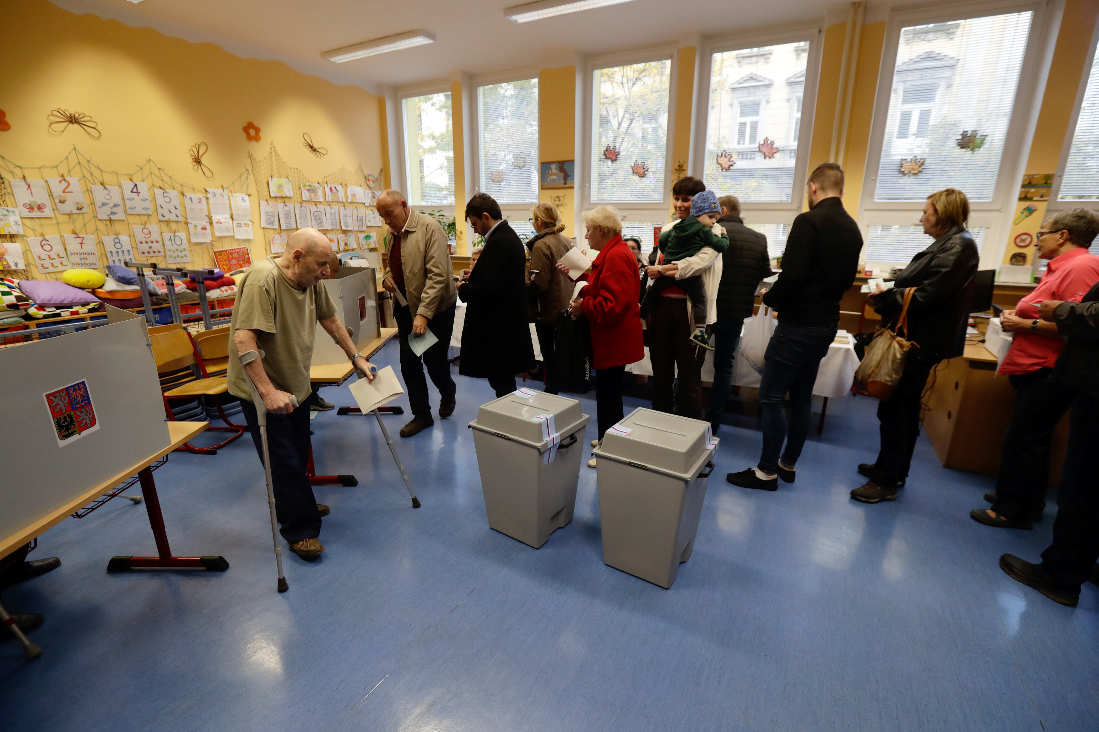 People queue to cast their votes in parliamentary elections at a polling station in Prague, Czech Republic October 20, 2017 People queue to cast their votes in parliamentary elections at a polling station in Prague, Czech Republic October 20, 2017