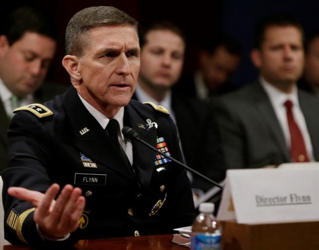 Then Defense Intelligence Agency director U.S. Army Lt. General Michael Flynn testifies before the House Intelligence Committee on ''Worldwide Threats'' in Washington February 4, 2014. REUTERS/Gary Cameron