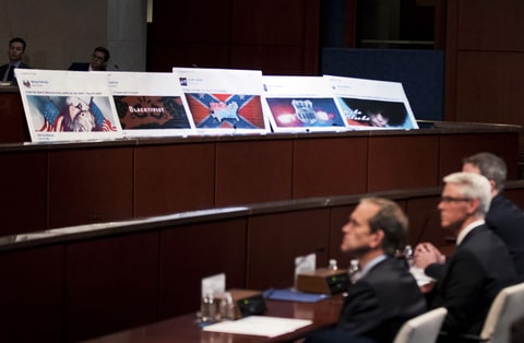 Kent Walker, Colin Stretch, Sean Edgett. Facebook ads linked to a Russian effort to disrupt the American political process are displayed as, from left, Google's Senior Vice President and General Counsel Kent Walker, Facebook's General Counsel Colin Stretch, and Twitter's Acting General Counsel Sean Edgett, testify during a House Intelligence Committee hearing on Capitol Hill in Washington