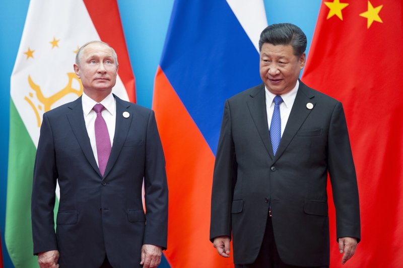 US policy drives Russia, China together ahead of summit