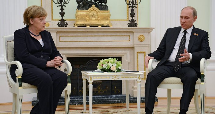 Russian President Vladimir Putin and German Chancellor Angela Merkel during meeting in the Kremlin on May 9, 2015