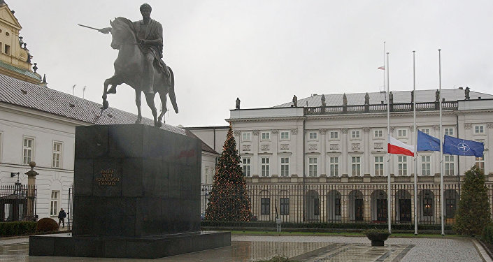 Poland's , European Union and NATO flags are lowered to half staff in front of the Presidential Palace in Warsaw, Poland
