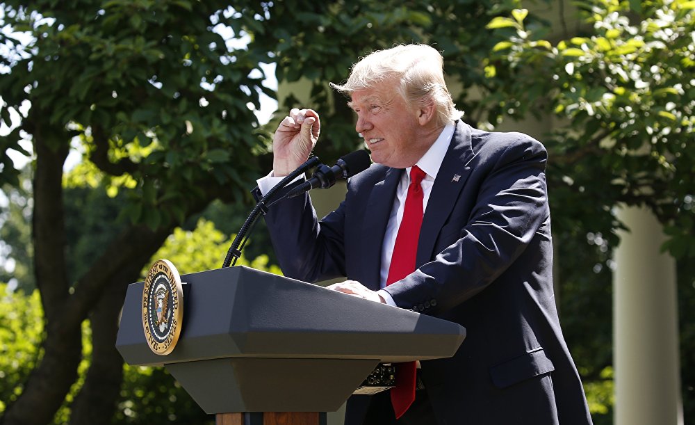 US President Donald Trump refers to amounts of temperature change as he announces his decision that the United States will withdraw from the landmark Paris Climate Agreement, in the Rose Garden of the White House in Washington, US, June 1, 2017. US President Donald Trump refers to amounts of temperature change as he announces his decision that the United States will withdraw from the landmark Paris Climate Agreement, in the Rose Garden of the White House in Washington, US, June 1, 2017.