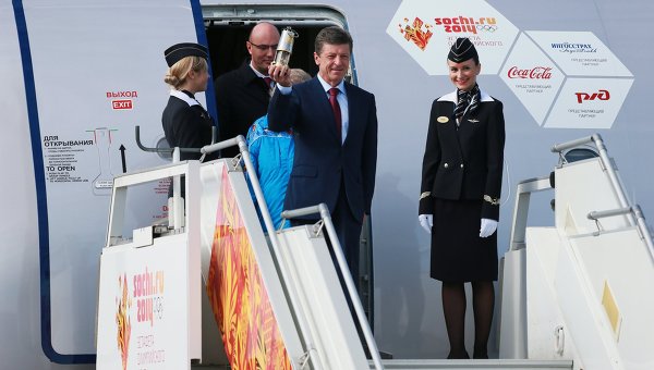 Sochi 2014 Olympic Flame Touches Down in Moscow