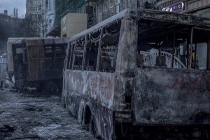 Police buses burnt by 